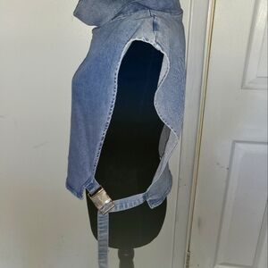 Beautiful lite Jean top with the sides open great for a nice summer night out.